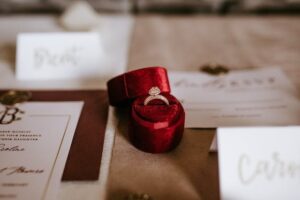 PA red velvet box with a diamond engagement ring image