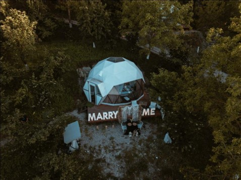A glamping dome decorated for a wedding proposal